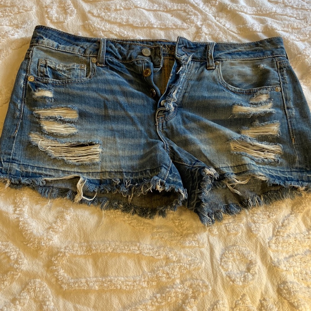 American Eagle tomgirl midi distressed jean shorts